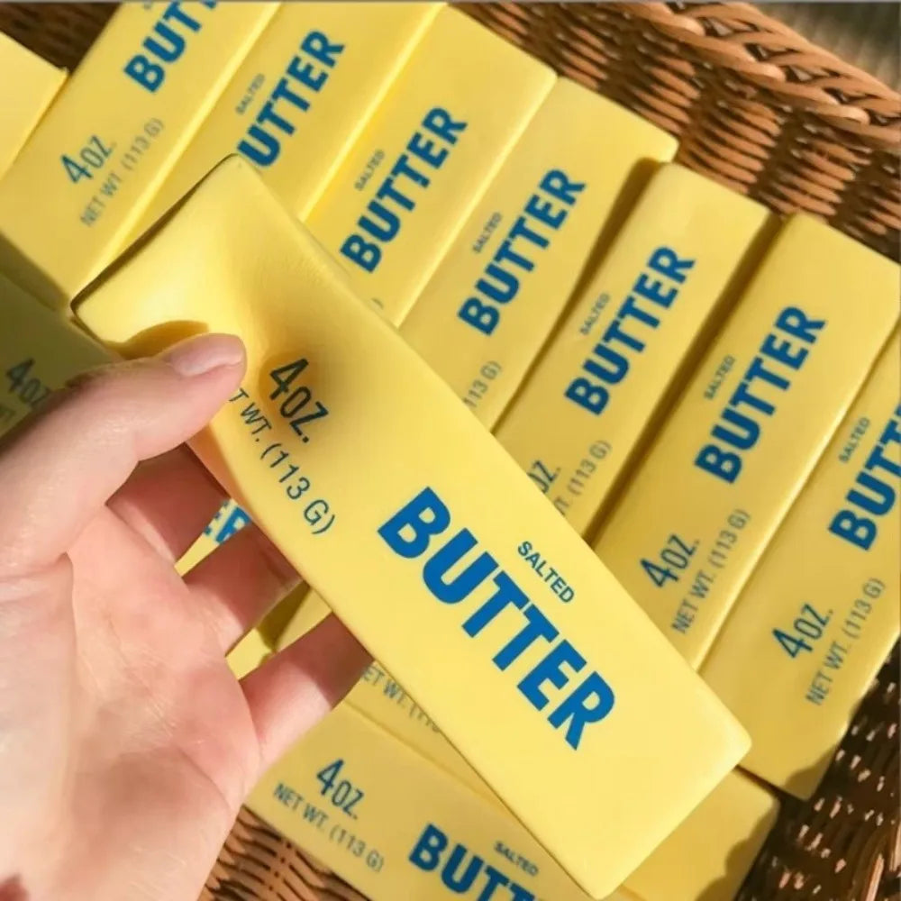 Butter Stick Squishy — in hand